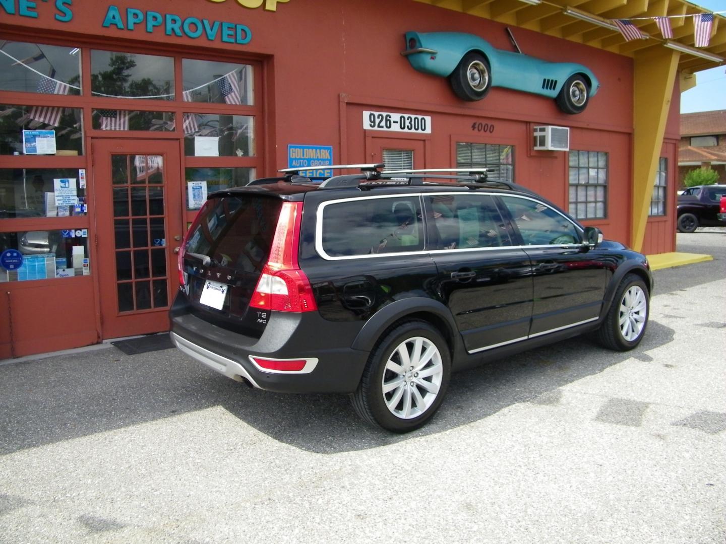 2011 Black /Beige Volvo XC70 T6 AWD (YV4902BZ9B1) with an 3.2L L6 DOHC 24V engine, 6-Speed Automatic transmission, located at 4000 Bee Ridge Road, Sarasota, FL, 34233, (941) 926-0300, 27.298664, -82.489151 - Photo#4